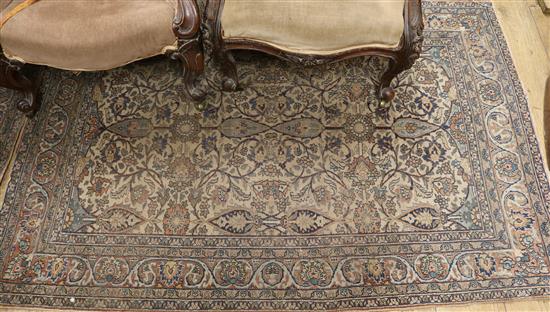 Two Persian foliate design rugs